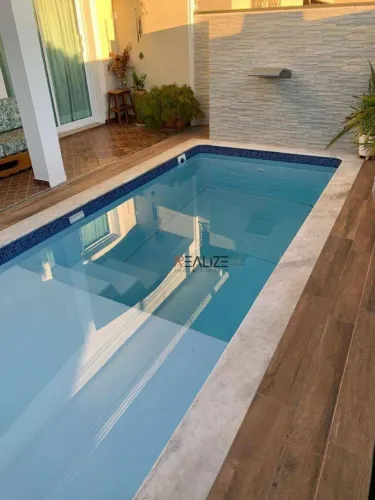 Casa com piscina e 3 dormitórios à venda, 139 m² por R$ 1.010.000 - Jardim Olinda - Indaia