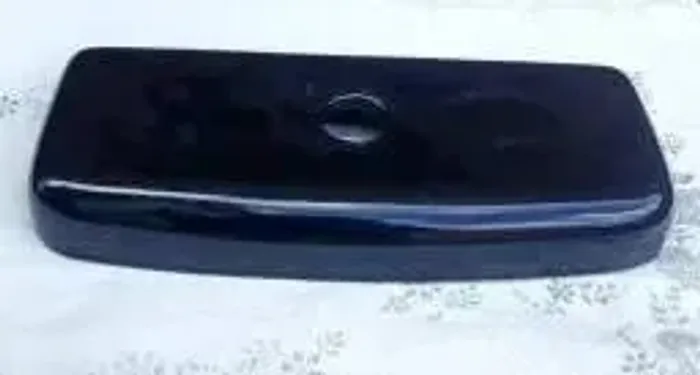 Tampa para caixa de descarga Deca cor preta 