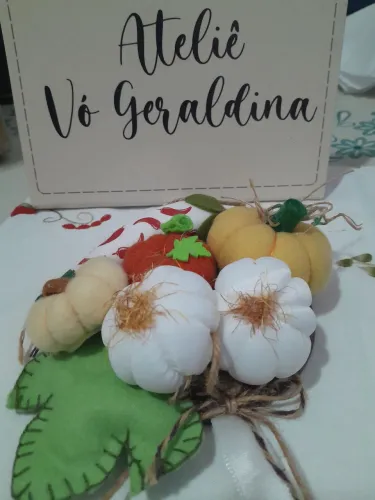 Suporte com argola para pendurar pano de prato