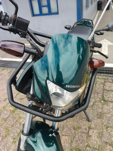 Vendo ou troco moto falcon 400 por Titan 160 acima de 2018