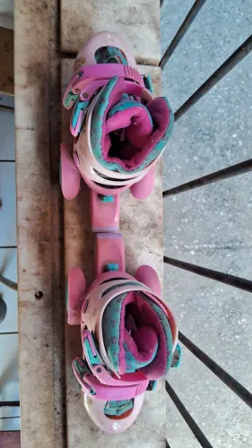 Patins menina rosa