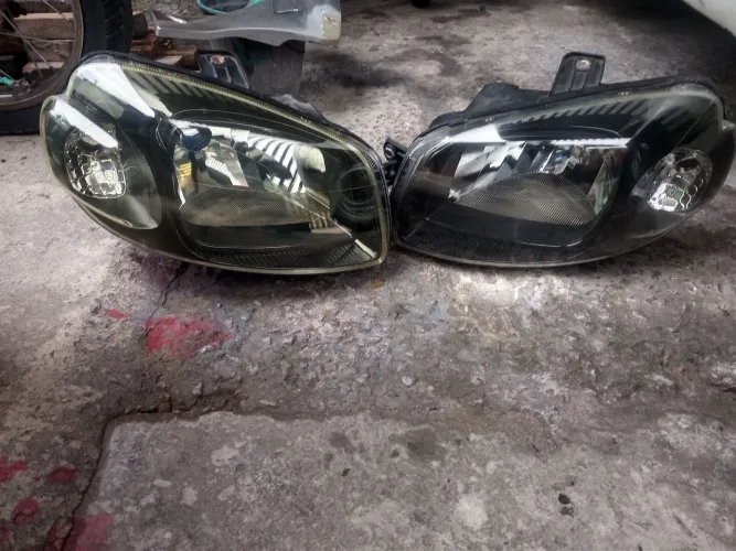 Farol máscara negra Uno Fiorino paralelo 