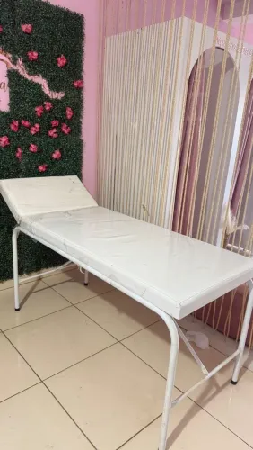 Maca de massagem e cadeira