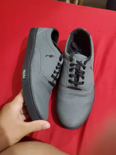 E um Sapato polo used Uma vez