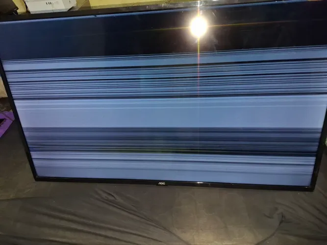 Tv aoc 42 defeito listras na tela