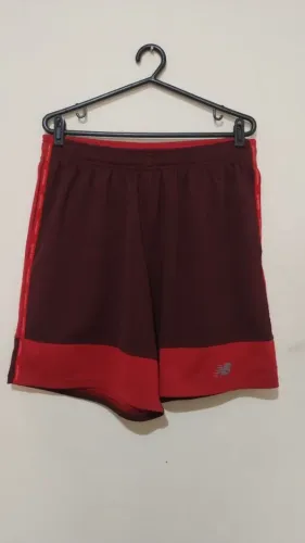short new balance vermelho