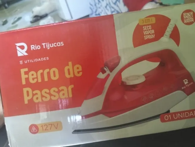 Ferro de passar novo na caixa