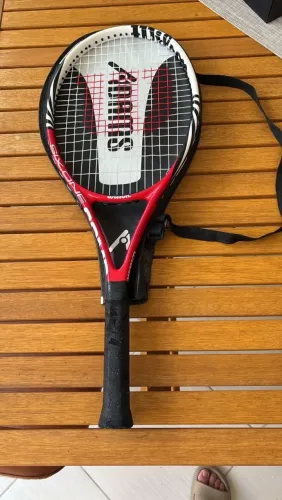 Raquete Wilson 4 1/2 + Capa Adams<br>R$200