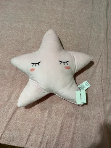 Almofada de estrela rosa 