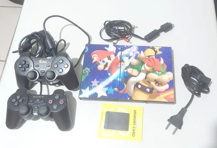 PLAYSTATION 2 - PS2 - SLIM - DESBLOQUEADO - 2 CONTROLES - LEITOR OK PERFEITO.