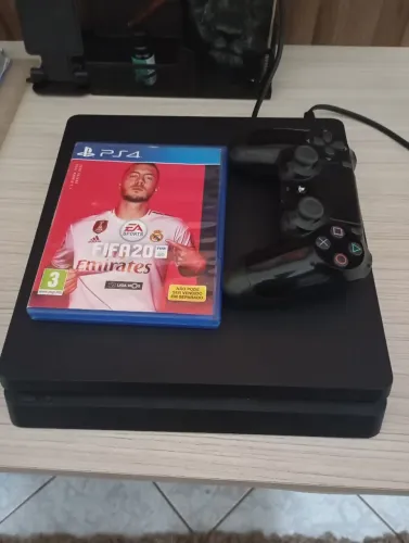 Vendo PS4 slim com 1 controle fifa 26 e red remdemption 2