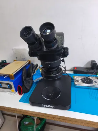 Vendo microscópio binocular 