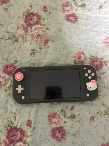 Nintendo Switch Lite 128gb + case + grips
