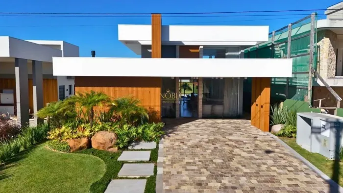 Casa nova com 4 suítes no Reserva das Águas  Torres/RS.