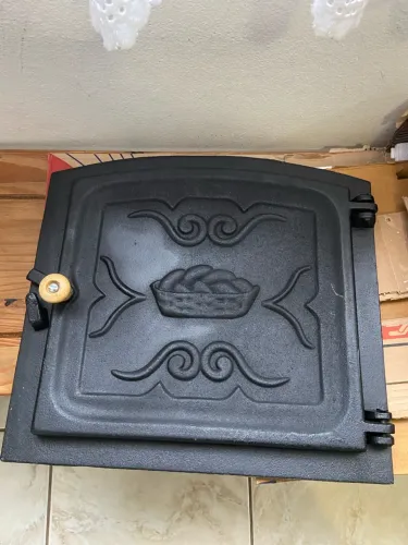 Tampa de forno à lenha