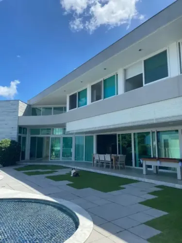 **"EXCLUSIVIDADE ABSOLUTA: CASA LUXUOSA EM ALPHAVILLE ESPERA POR VOCÊ!"**