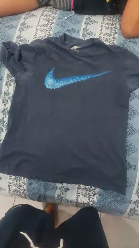 Camiseta Nike Azul Original tamanho G mas serve M melhor
