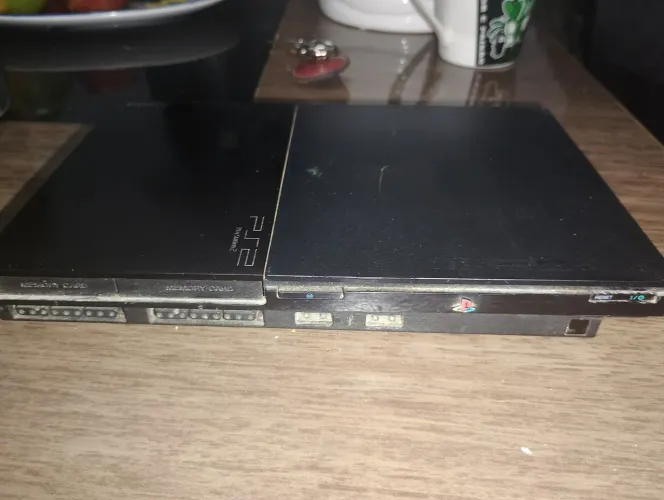 Troco por um celular ou vendo: Playstation 2 e Xbox 360.