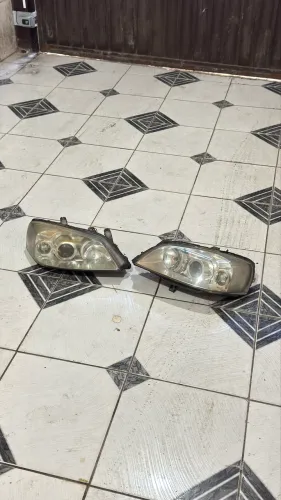 Par de farol Astra hatch ( modelo novo ) 