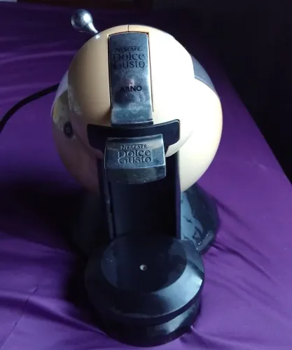 Cafeteira dolce gusto antiga 