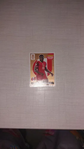 Figurinha extra sticker bronze Alphonso Davies