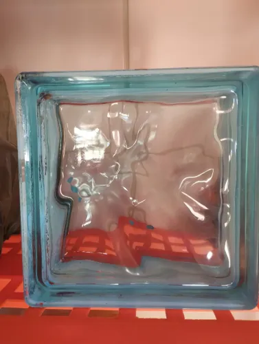 Vendo tijolos de vidro azul , 19 × 19,5 cm .