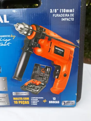 Furadeira de impacto Mondial 650w, 127v, com maleta e 19 acessórios, na embalagem. 