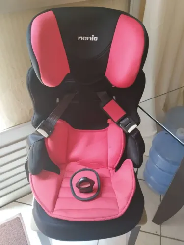 Cadeira de bebê conforto e bicicleta
