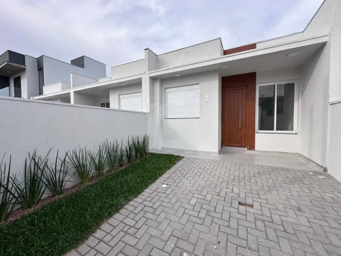 CASAS A VENDA NO BAIRRO VILA RICA 2 DORMITÓRIOS - 1 SENDO SUÍTE