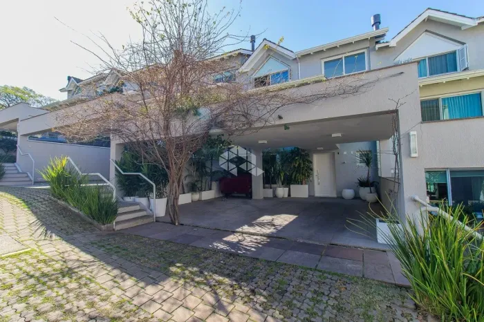 Casa em condomínio para comprar no Três Figueiras com 3 suítes