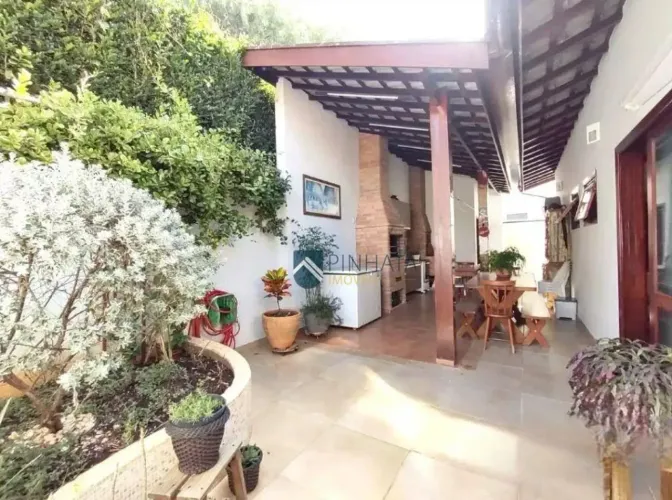 Casa com 4 dormitórios à venda, 170 m² por R$ 1.450.000,00 - Condomínio Jardim das Palmeir