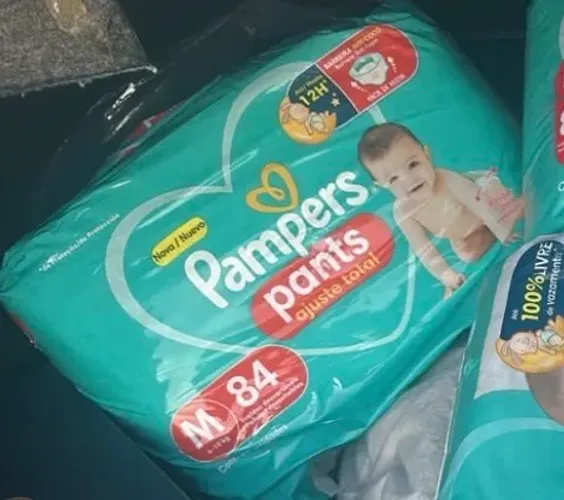 Fralda Pampers pants ajuste total