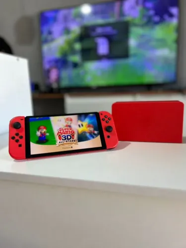 Nintendo Switch OLED c/ vários jogos 