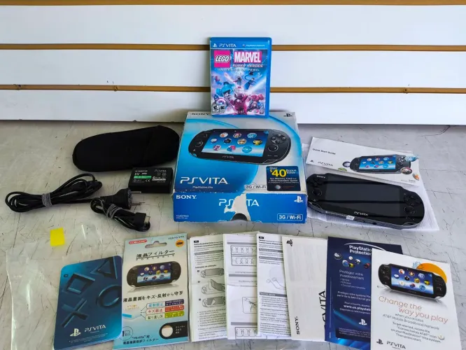 PS vita na caixa completo todo original  com jogo leia a descrição  NÃO ACEITO OFERTA