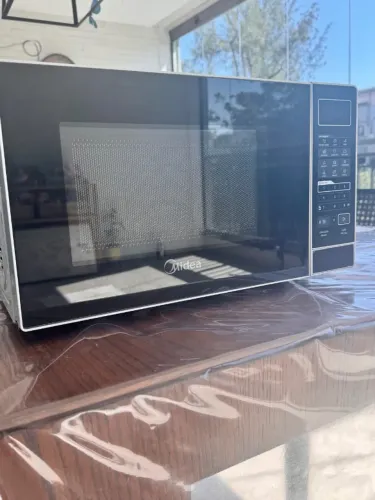 Microondas novo Midea 20 l