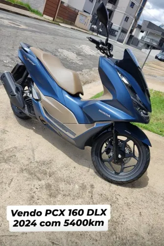 Vendo PCX 160 DLX, a mais completa com apenas 5400 km. Pneus zeros.