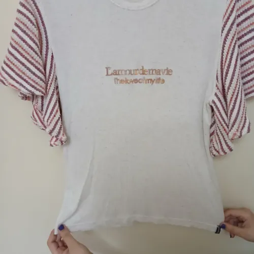 Blusa mangas tricô