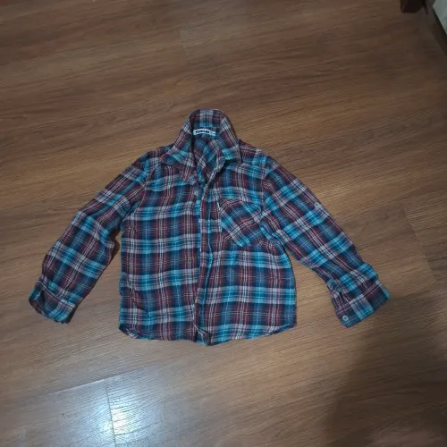 Camisa xadrez marca polegar tamanha 6