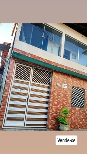 Vendo imóvel cm dois pavimentos cm entradas independentes e mais uma kitnet.