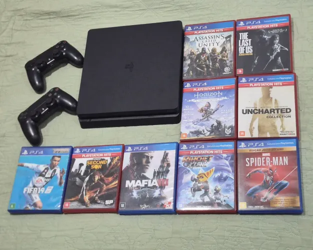 PS4 SLIM 500G | 9 JOGOS | 2 CONTROLE | | ACEITO OLX PAY |