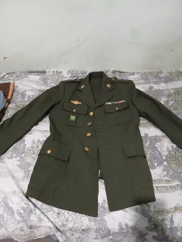 Uniforme verde eb muito novo