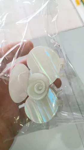 Presilha de cabelo em formato de orquídea