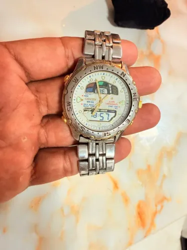 Relógio Citizen Promaster c210 série ouro