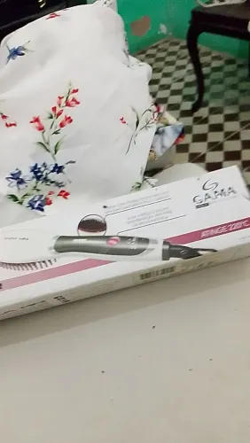 Escova ALISADORA GAMA R$50,00