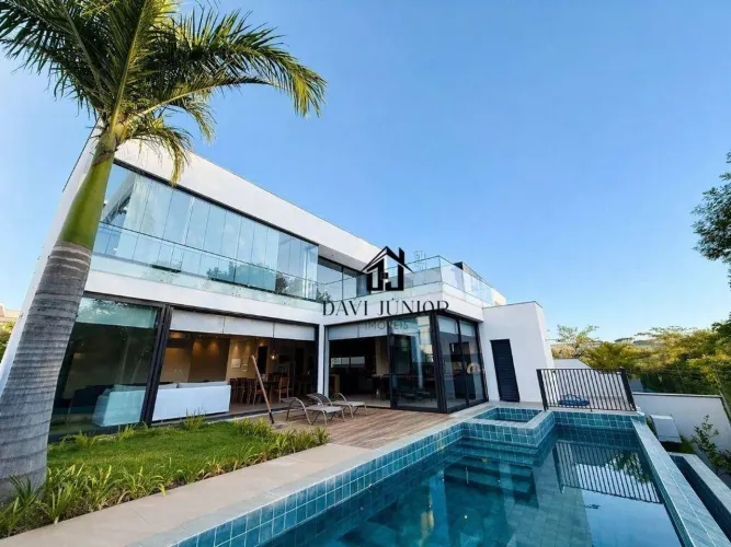 Casa com 4 suítes para alugar, 402 m² por R$ 21.995/mês - Alphaville Nova Esplanada IV - V