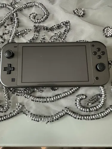 Nintendo Switch Lite - Pokémon Dialga & Palkia Desbloqueado