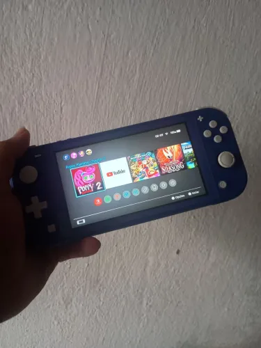 Nintendo switch lite destravado 256g venda ou troca com torna leia o anúncio 