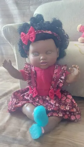 Boneca Afra,52 cm, corpo de tecido,membros de vinil articulados, nova, com motor q canta