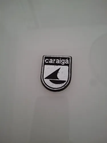 Emblema original da Concessionária VW Caraigá