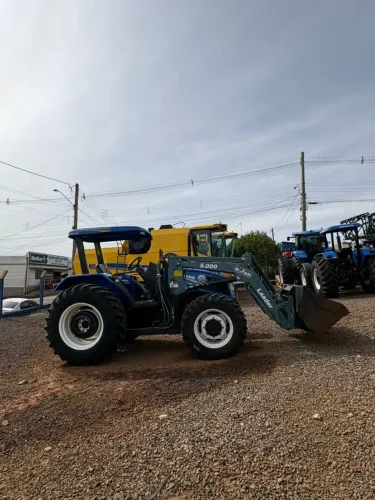 TRATOR NEW HOLLAND TL 75 2014 + PLAINA JAN LAADER 5000